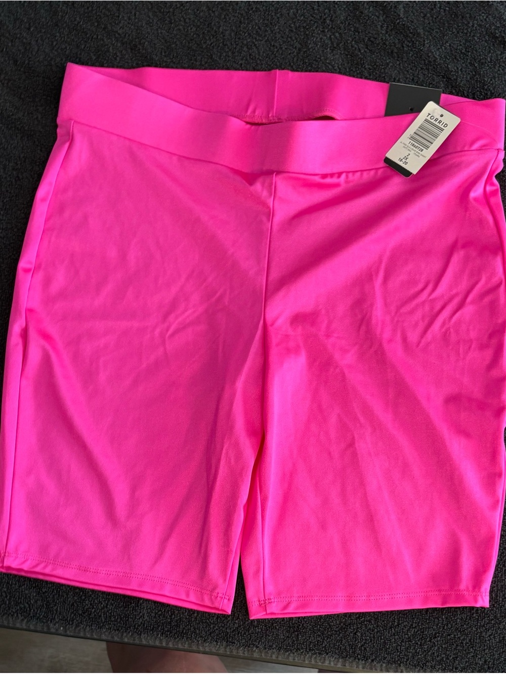 Torrid neon pink athletic biker shorts featuring a high-rise waistband. Sz 2